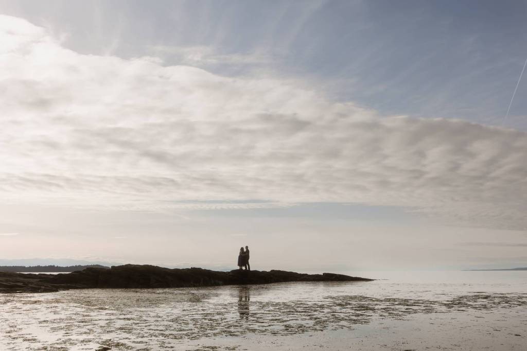 Image of a couple embracing in the distance.